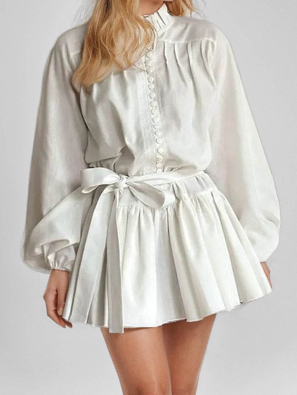 Elegant long-sleeved tie-neck printed dress